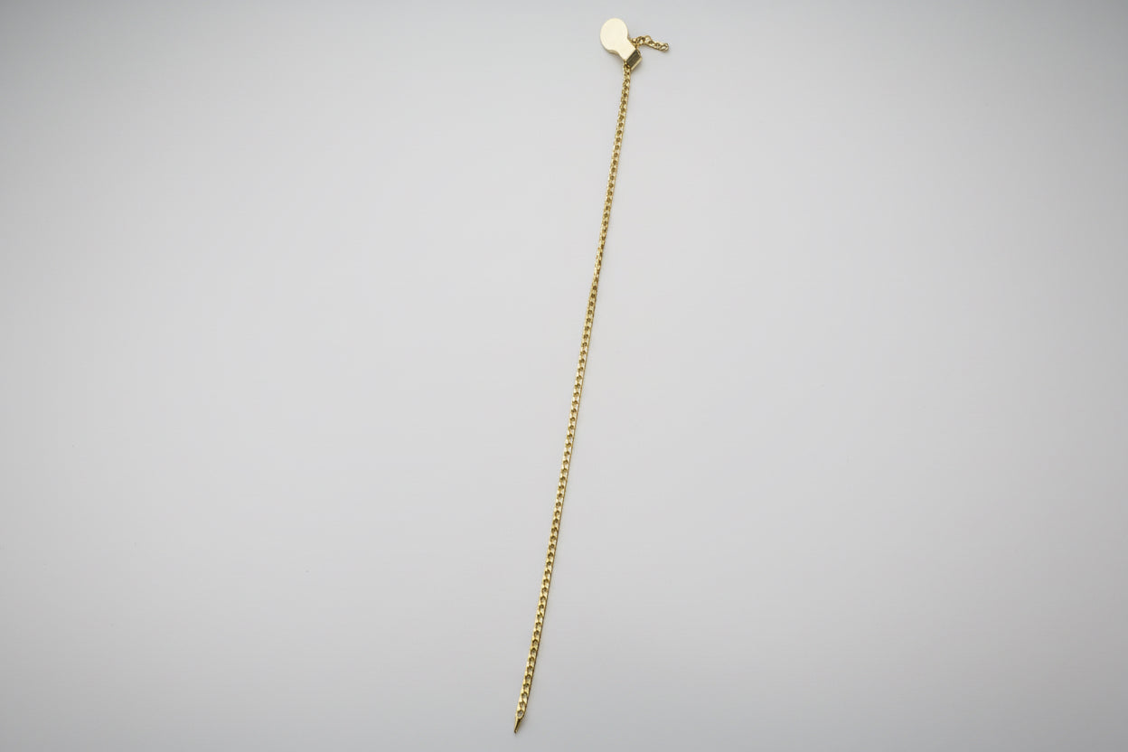 White pants with a gold zipper on a white background